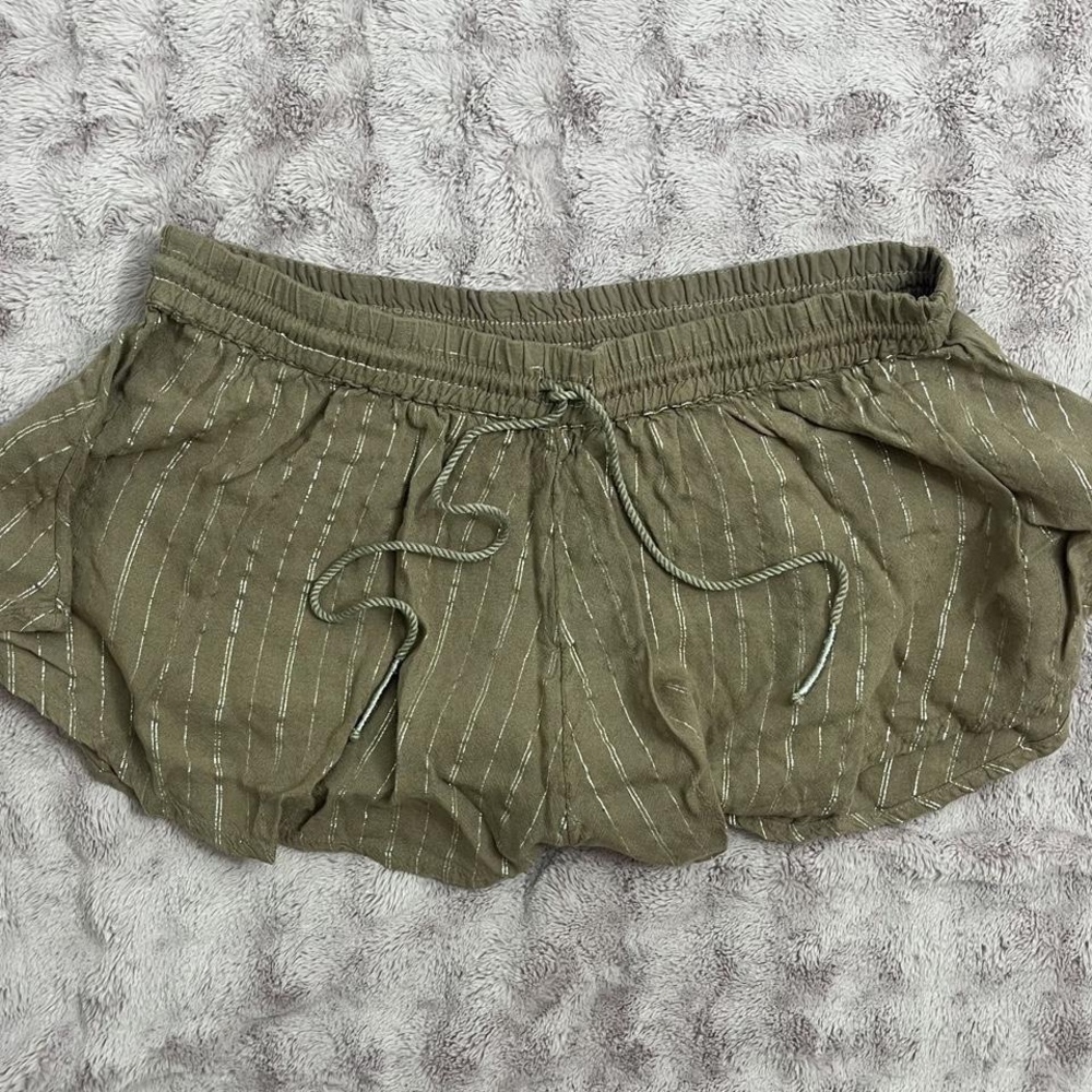 Super cute boho light brown flowy mini shorts with silver glittery details